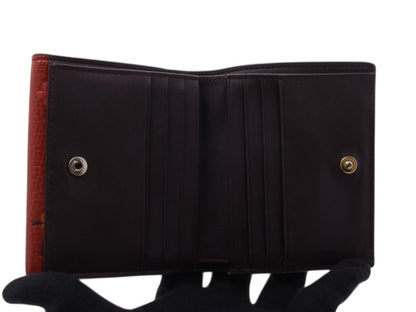 Coach Floral Buckle Leather Wallet