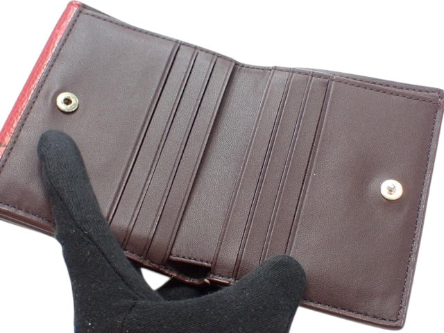 Coach Floral Buckle Leather Wallet